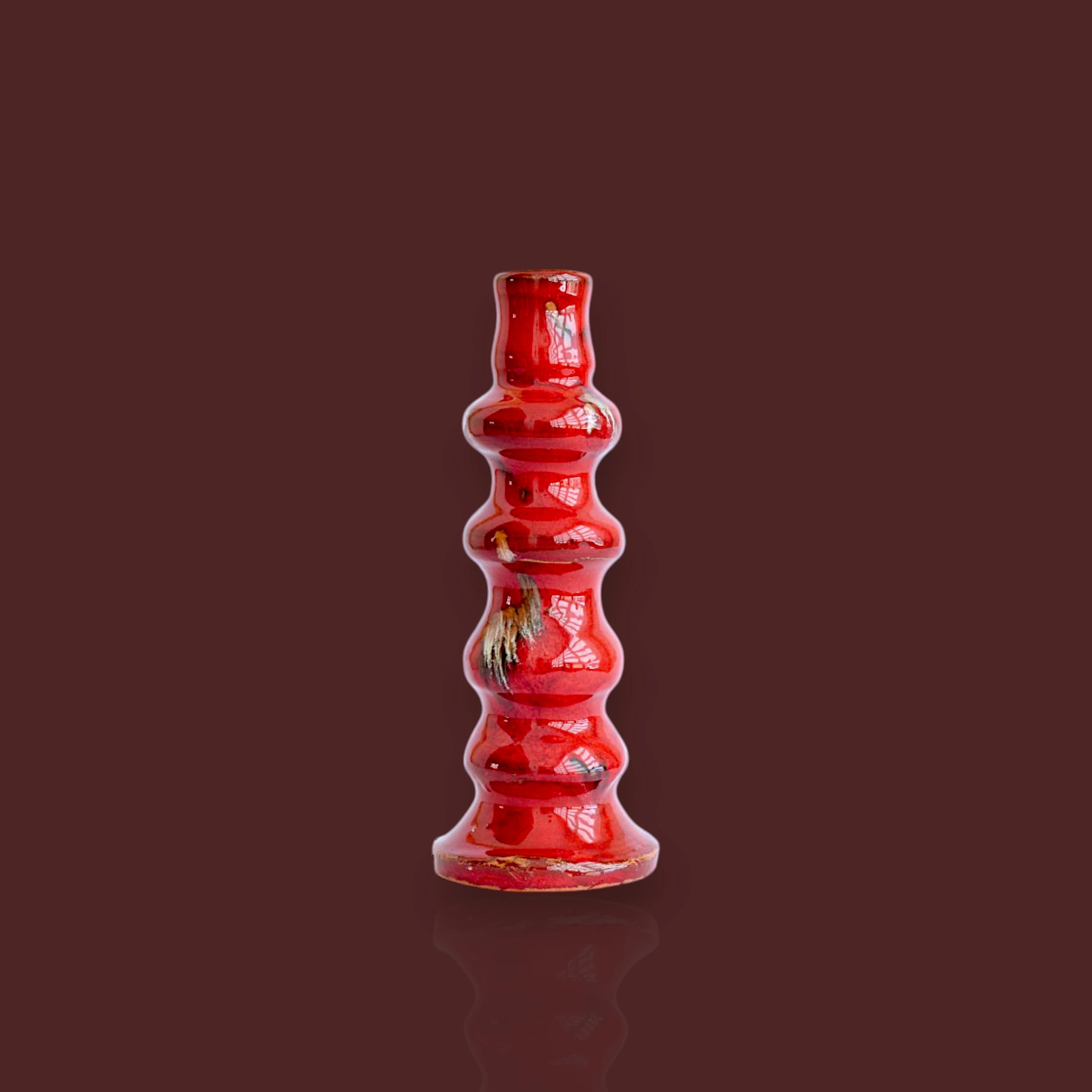 Candelabro ondulado Huelva marmolado de cerámica artesanal color rojo