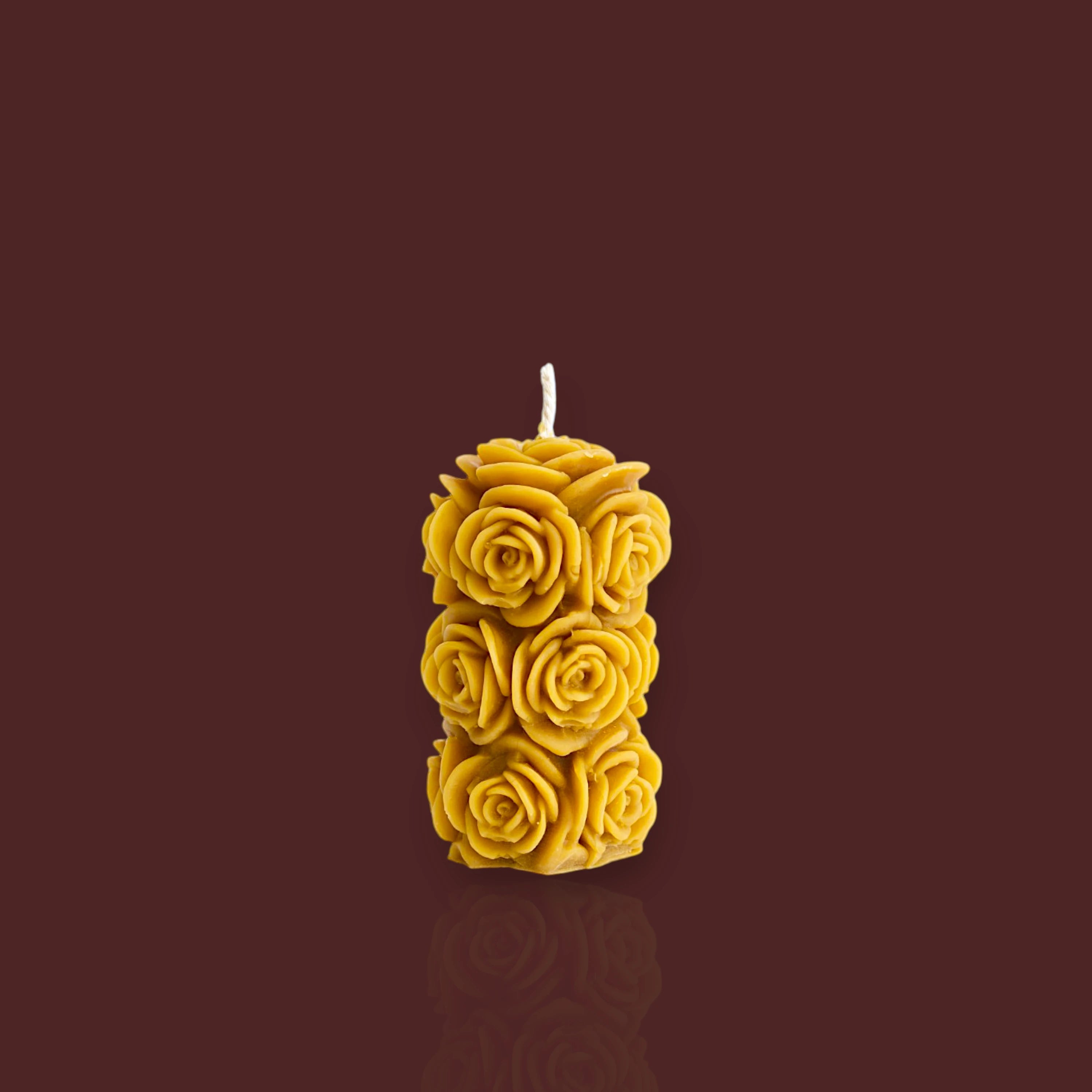 Vela cilíndrica de flores